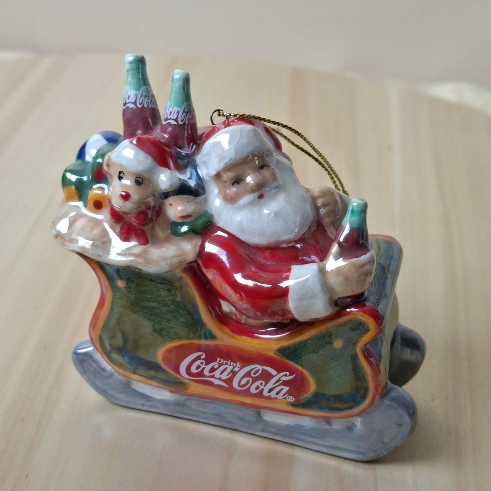 2004 Coca-Cola Pearlescent Porcelain Santa in Sleigh Christmas Tree Ornament